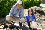 Rob and a young gardener work to prepare the site of the Healing Garden